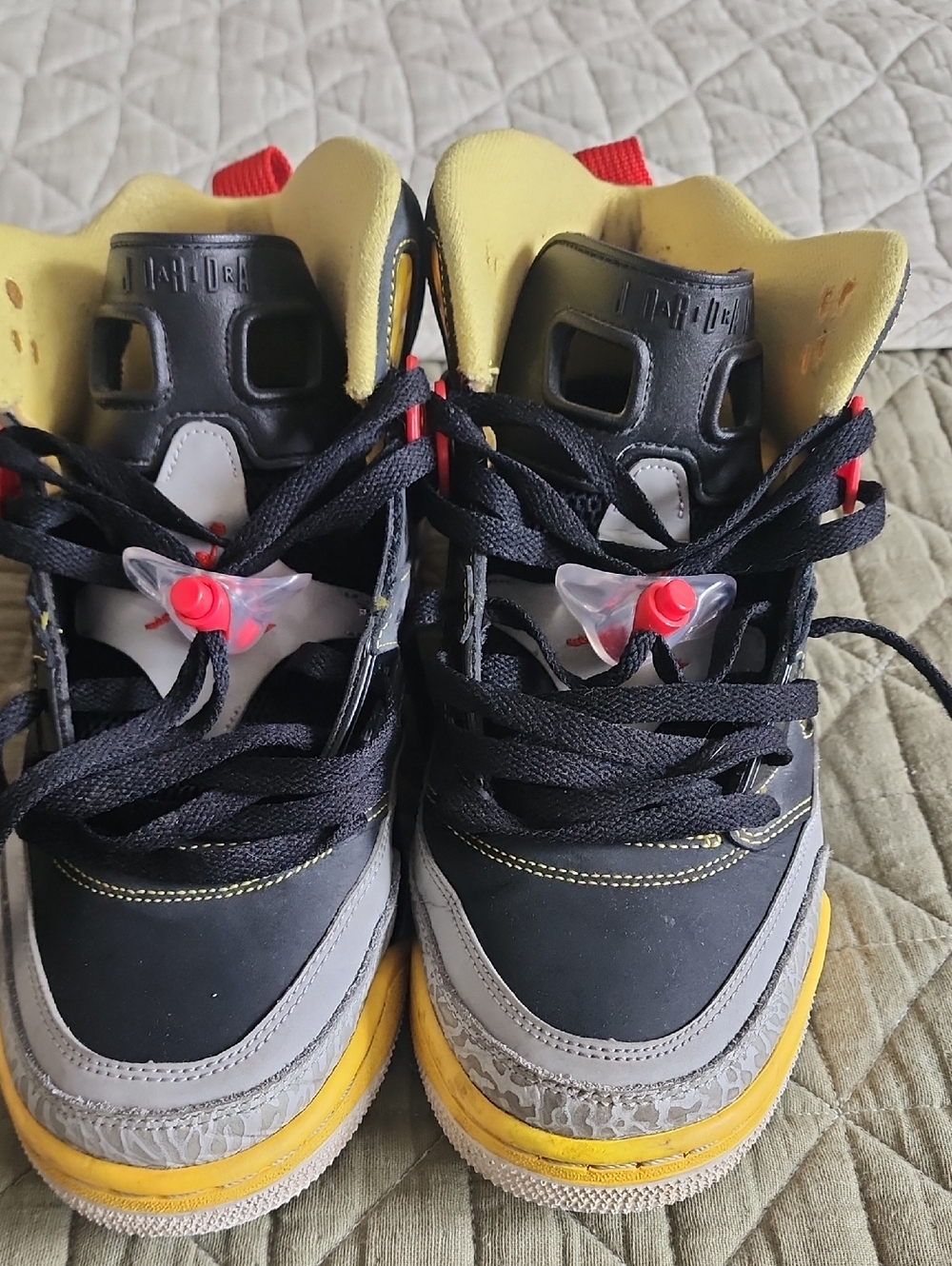 Jordan Black, Yellow & Red High-Top Sneakers